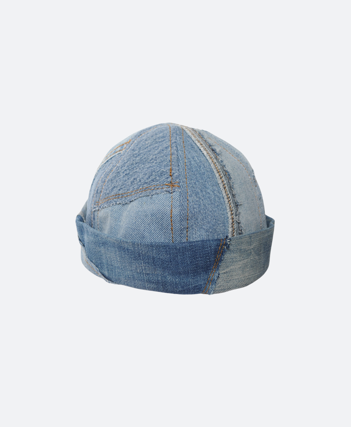 Voorkant - Handgemaakte denim patchwork docker cap met verstelbare klittenbandsluiting, unisex ontwerp van Sevaes.