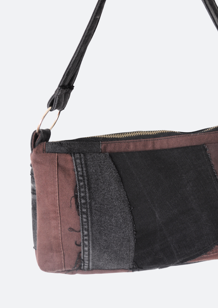 Distressed Zwart-Bruine Schoudertas - close up - gemaakt van reststofjes jeans - Sevaes