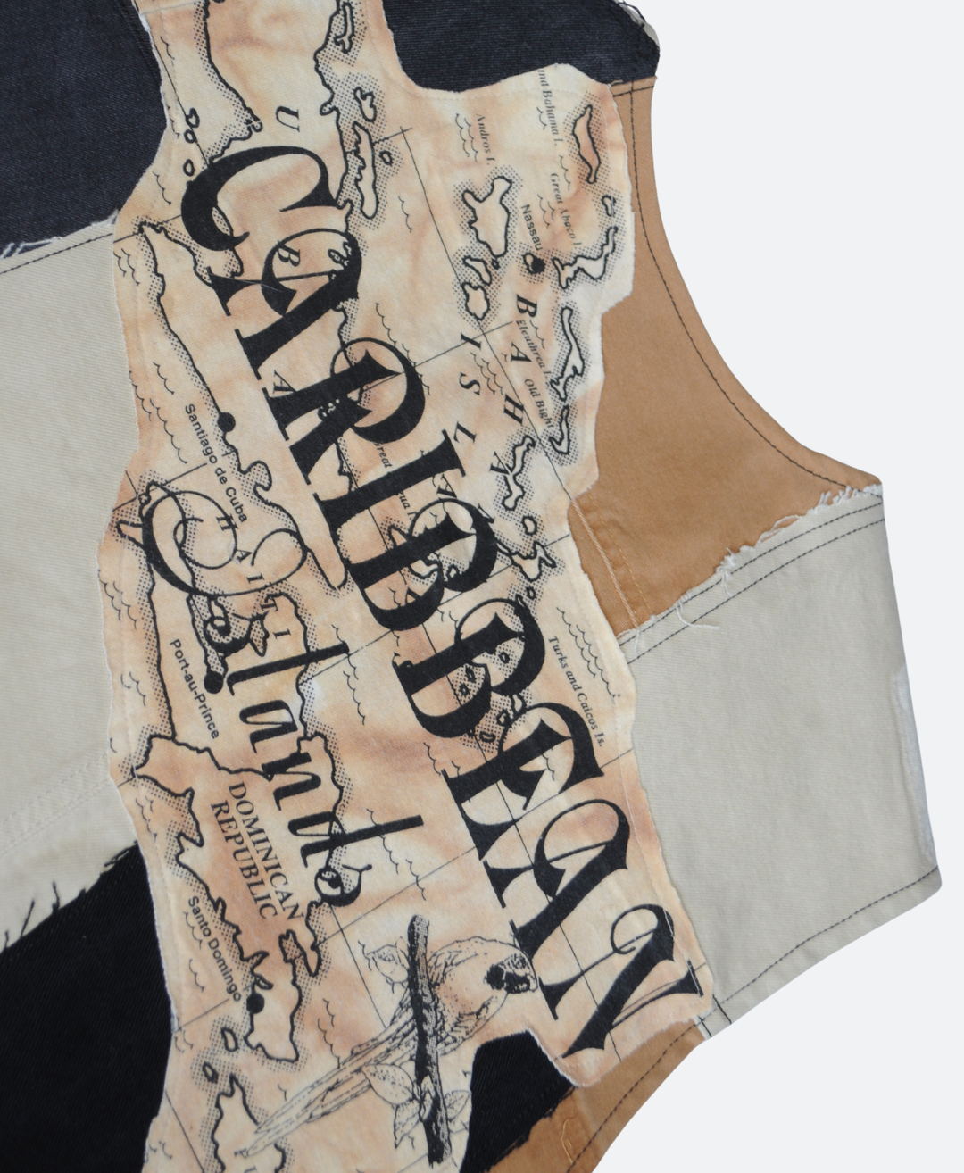 Achterkant Detail Caribbean Patchwork Utilitvy Vest van Sevaes, Gemaakt van oude denim broeken in de kleur bruin, zwart en beige