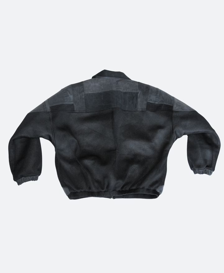 Achterkant - Zwarte upcycled denim en mesh bomberjack, handgemaakt unisex ontwerp van Sevaes.